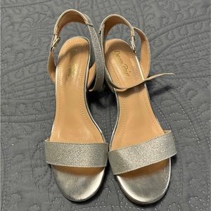 Silver size 6 dress heels. Worn once. Super comfortable.